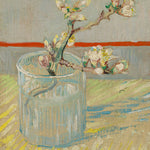 Bloeiend amandeltakje in een glas